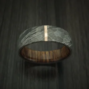 Ring with Rock Hammer Finish and Vertical 14k Rose Gold Inlay and Wood Sleeve